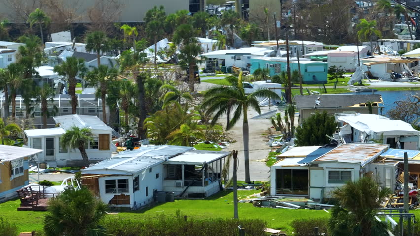 Destroyed by hurricane Ian suburban houses in Florida mobile home residential area. Consequences of natural disaster | Shutterstock HD Video #1098837229