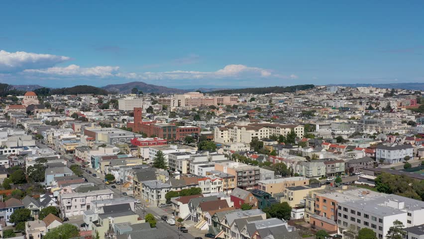 Aerial orbit of colorful house blocks in a city neighborhood in San Francisco. | Shutterstock HD Video #1098839337