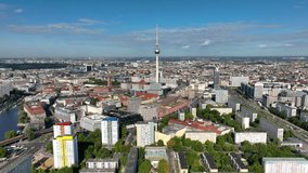 City of Berlin, Germany from above.Aerial view of cityscape showing architectural landmarks Fernsehturm TV Tower and Berlin Cathedral by day. Drone Flight over Alexanderplatz TV Tower, Sunflairs circa