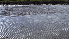 Waves at low tide view of the ocean floor - Powered by Shutterstock - Get 15% off with code: PIKWIZARD15