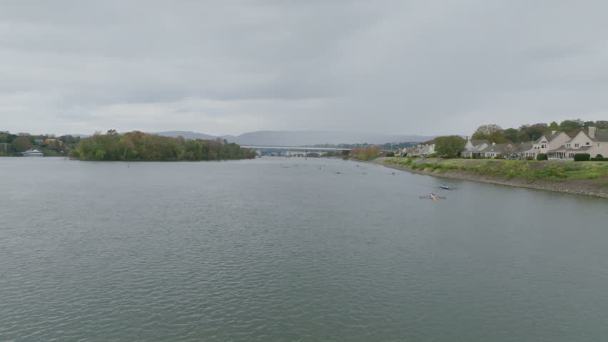Aerial flyover on the Tennessee River of the Head of the Hooch in Chattanooga flying over rowers in boats.