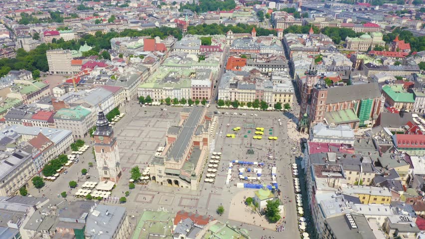 Inscription on video. Krakow, Poland. Main Square. Big city square of the 13th century. View of the historic center. Name is burning, Aerial View