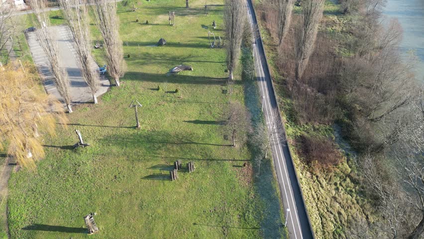 Drone flying over a park and houses