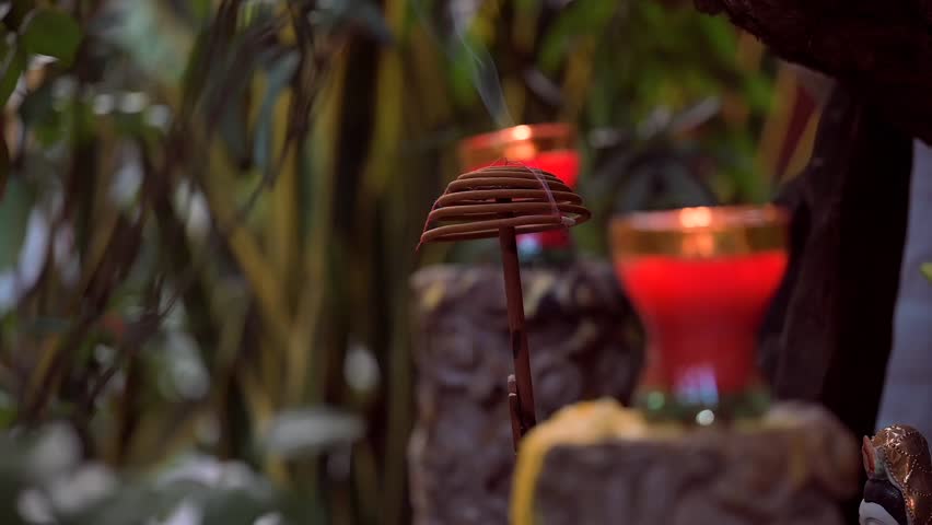 A closeup footage of incense burning at the Buddhist Chua Quan Su Temple in Hanoi, Vietnam