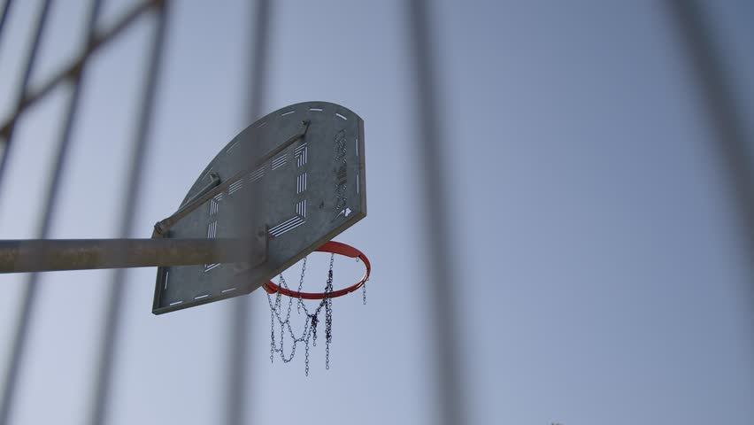 Basketball Hoop Over The Fence