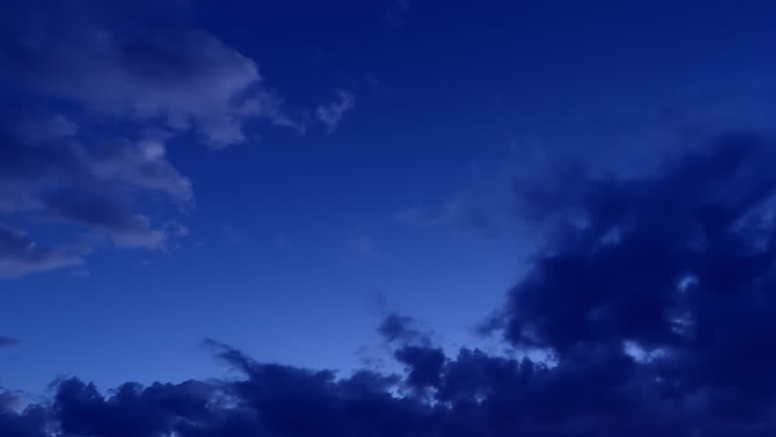Timelapse of beautiful sunset sky turning to blue evening sky, cloudscape footage, clouds time lapse, beautiful cloudy motion. Royalty-Free Stock Footage #1098895349