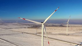 windmills work in winter, windmills to generate electricity, drone video, 4k