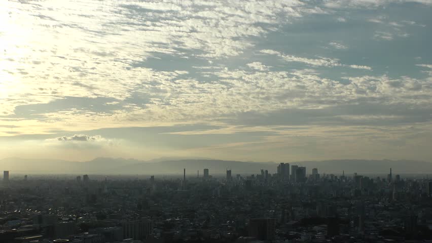 NAGOYA, JAPAN : NAGOYA CITY in sunset. Aerial view of buildings and street traffic around Nagoya station and Sakae area (central downtown). Time lapse shot, dusk to night. Travel and tourism concept.