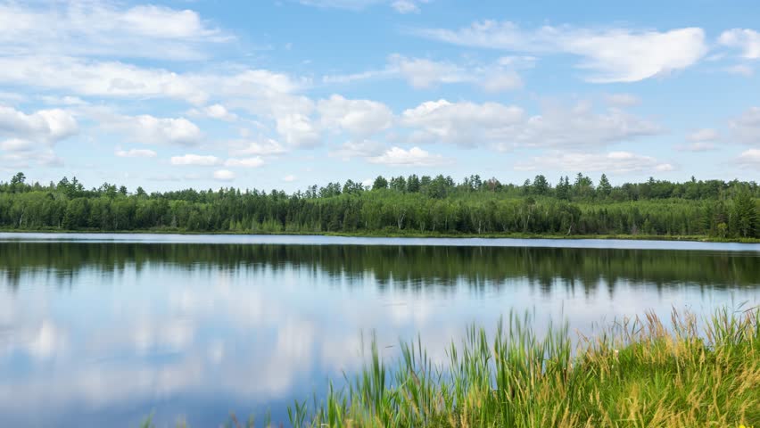 Time lapse of the clouds moving above a lake in Northern Minnesota.
