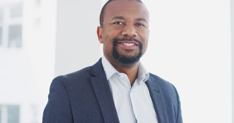Happy, smile and face of businessman in office for management, leadership and vision. Professional, executive and future with portrait of black man ceo in startup agency for mindset, career or goal | Shutterstock HD Video #1098909859