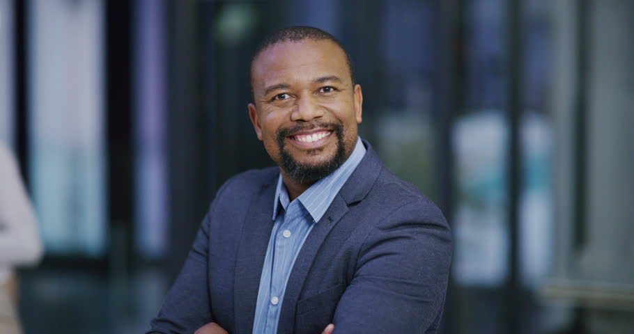 Happy, smile and face of businessman in office for management, leadership and vision. Professional, executive and future with portrait of black man ceo in startup agency for mindset, career or goal | Shutterstock HD Video #1098909871