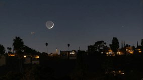 Time lapse of crescent moon setting over neighborhood in Los Angeles, California - Powered by Shutterstock - Get 15% off with code: PIKWIZARD15