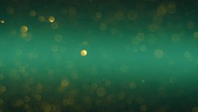 Particles of gold color fall on a dark green background in an abstract order, beautiful reflection of glare from the light, bokeh and out of focus glare. Slow motion, 8K downscale, 4K. - Powered by Shutterstock - Get 15% off with code: PIKWIZARD15