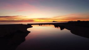 Video of a Mediterranean beach at sunrise. Image in 4k