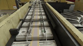 100 USA dollars banknotes are being printed by currency press machine. Animation showing a process of american money printing. Seamlessly looped video of money printing process.