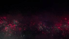Colorful fireworks festival. Beautiful fireworks close-up view in slow motion. Wonderful real fireworks in the night sky shot with a telephoto lens. fireworks show. 4K slow motion video