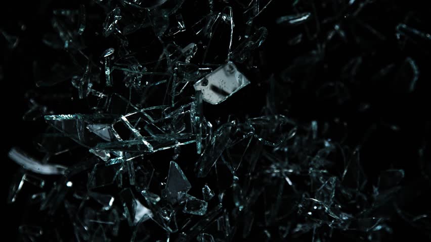 Super Slow Motion Shot of Glass Shards Flying Towards Camera Isolated on Black at 1000fps. | Shutterstock HD Video #1098930039