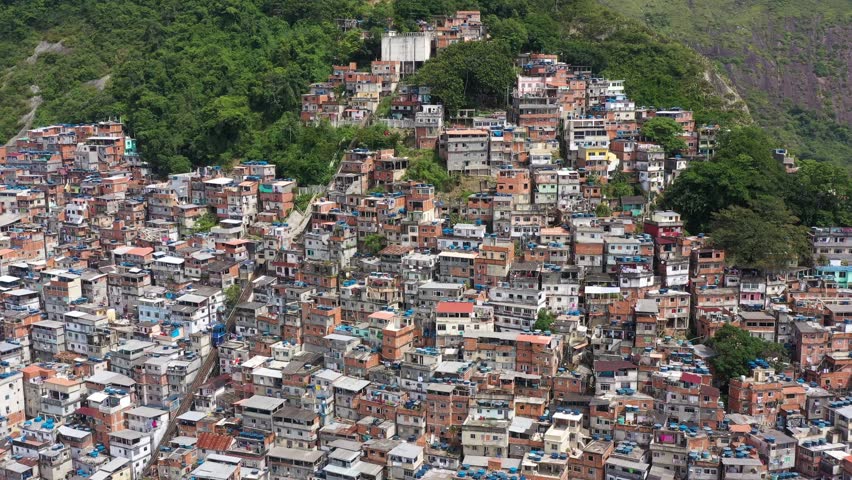 Cantagalo-Pavao-Pavaozinho Favelas. Rio de Janeiro, Brazil. Aerial View. Drone Flies Forward, Tilt Down Royalty-Free Stock Footage #1098931937