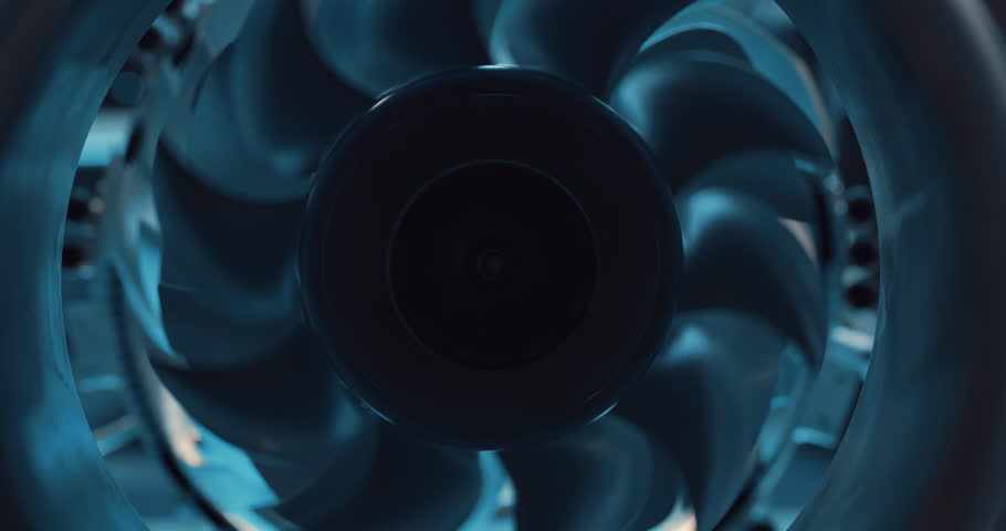 Industrial High Tech Sustainable Electric Turbine Motor in a Factory Workshop. Tech Facility with Servers, Computers and Research Equipment. Zoom Out Footage From Inside the Engine with Spinning Fan Royalty-Free Stock Footage #1098933865