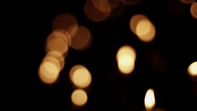 Red and Yellow Colors of Church Candle Bokeh video