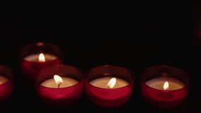 Red Wish and Pray Candles in a Catholic Church Video