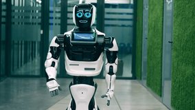 Cybernetic droid is talking and smiling in the corridor - Powered by Shutterstock - Get 15% off with code: PIKWIZARD15