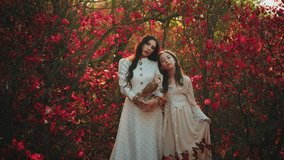 Two fantasy women walking in forest, young mother and adult daughter. Vintage dress. Owl barn owl white bird sits on hand Wisdom sign symbol. Woman queen and little girl princess. Autumn nature trees - Powered by Shutterstock - Get 15% off with code: PIKWIZARD15