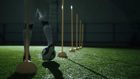 dribbling ball in football training, closeup view of legs of running professional african sportsman - Powered by Shutterstock - Get 15% off with code: PIKWIZARD15