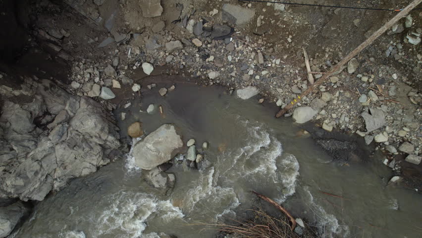Broken Highway road damaged Destroyed Flooded River, Ojai, California, Ventura River disaster Rain Storm Aerial
