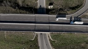 Altamura, Italy skyline with highway and traffic with drone video showing vehicles and revealing city.