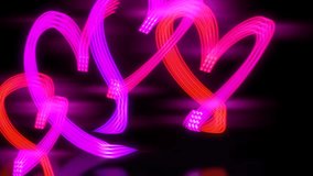 Pink and red light painting hearts on black background and mirror surface flipping through different light painting drawings of the same motive quickly - Powered by Shutterstock - Get 15% off with code: PIKWIZARD15