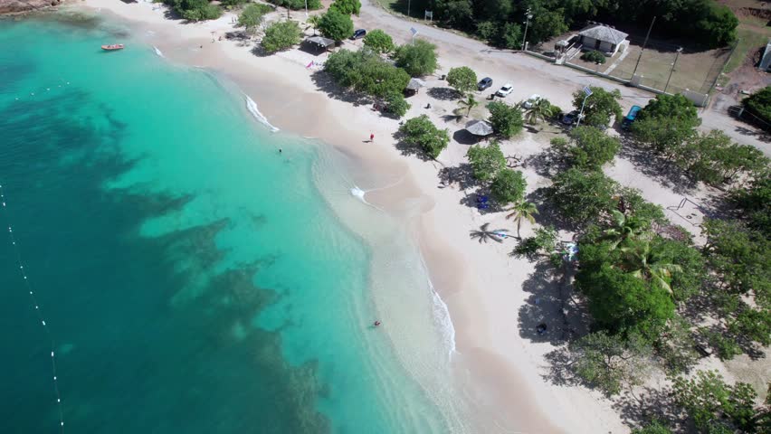 The drone aerial footage of Pigeon Point Beach in Antigua. Pigeon