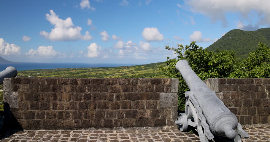 BRIMSTONE FORTRESS, ST KITTS - 23 DEC 2022: St Kitts Caribbean Brimstone Hill Fortress canon ocean pan. Fort is a National Park and UNESCO World Heritage Site. Cruise ship vacation destination.