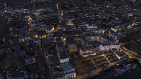 Establishing Aerial View Shot of London UK, United Kingdom, busy Richmond at night evening