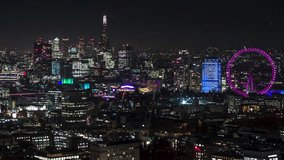 London Skyline, Magnificent Capital, City of London and River Thames, Establishing Aerial View Shot of London UK, United Kingdom, night cityskape