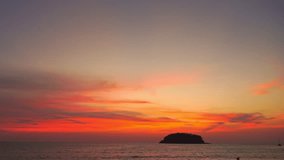 scenery red sky the sun down to the sea.
beautiful red sky at sunset in Kata beach Phuket Thailand