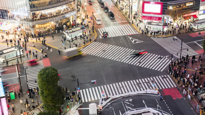 Night time lapse of car traffic transportation, crowded people walk cross road at Shibuya scramble crossing. Tokyo tourist attraction landmark, Japan tourism, Asia transport or Asian city life concept Royalty-Free Stock Footage #1098990369