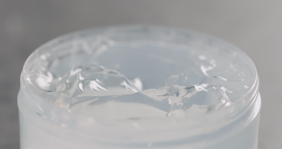 Slow motion man hand takes aloe soothing gel from a can | Shutterstock HD Video #1099007807