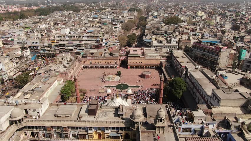 An aerial shot of Jama Masjid with people praying namaz in New Delhi,India
