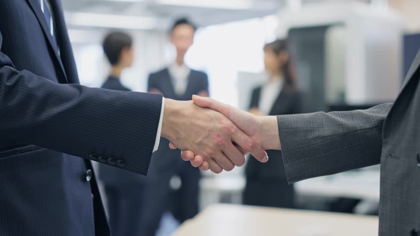 Group of Asian businessman shaking hands in office. Royalty-Free Stock Footage #1099023023
