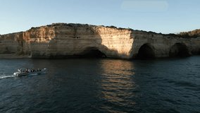 Drone Video of a Boat Approaching a Cave on the Coast of the Algarve, Portugal