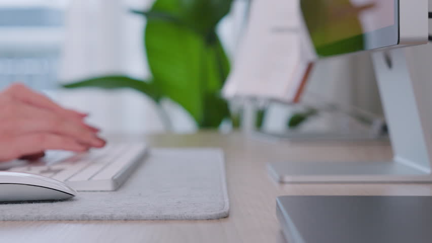 Girl Working On Computer At Home Office Table. - close up, slider
