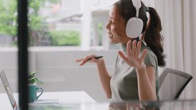 Taking a break work relax easy listen music joy sing a song at cozy home good time life balance remote WFH job. Mental health care enjoy fun dance reduce stress relief in Gen Z asia people young woman - Powered by Shutterstock - Get 15% off with code: PIKWIZARD15