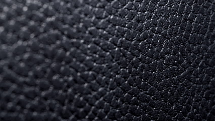 Black leather texture close up. Extreme close up footage. Royalty-Free Stock Footage #1099029473