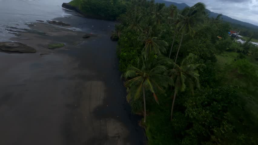 Black beach in Bali with FPV drone