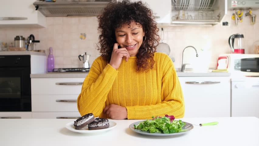 This video is about black woman diet resolution | Shutterstock HD Video #1099038577