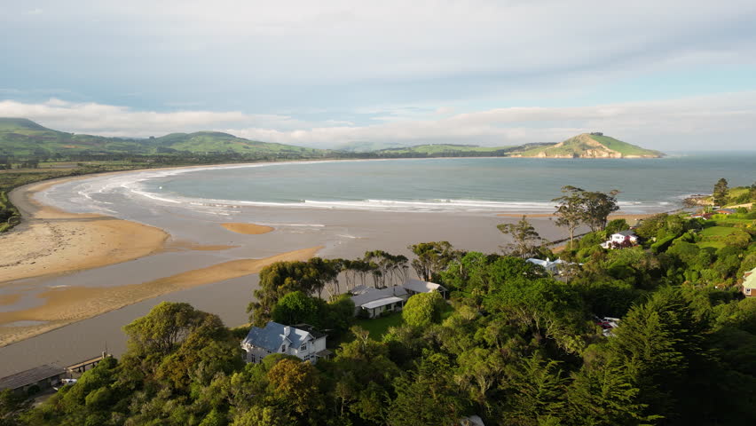 Waikouaiti River flows to Pacific ocean in Karitane town, South Island, New Zealand