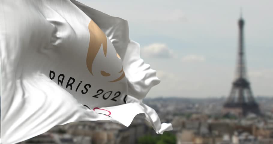 Paris, FR, Jan 2023: Close-up of the Paris 2024 Summer Olympics flag waving with blurred Paris skyline on the background. Rippled fabric. Selective focus. Realistic 3D render. Slow motion loop