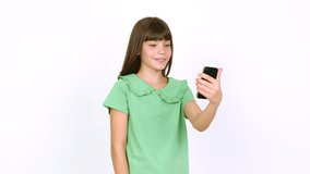 Little girl having a video conference over isolated background
