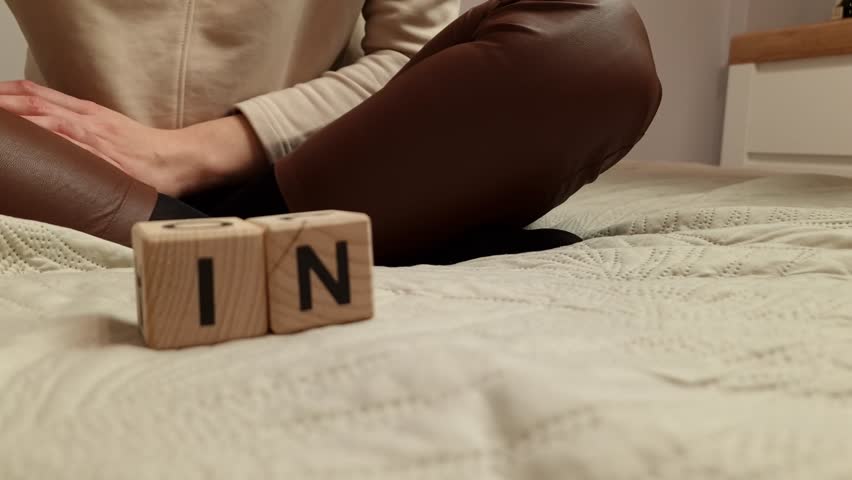 Woman composes the word injury from wooden blocks. Personal injury law concept Royalty-Free Stock Footage #1099051487